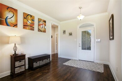 Entryway to open concept floorplan.