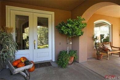 Arched entry to the front door. Please see virtual