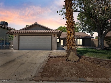 Mediterranean / spanish-style home featuring a til