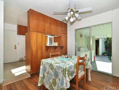 Dining area with ceiling fan, smooth ceilings and 