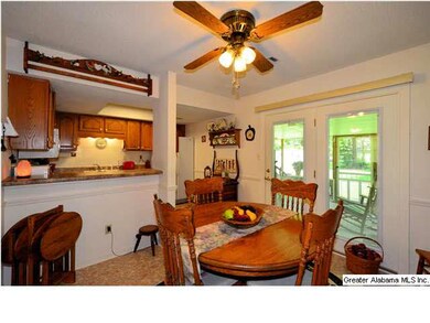 View from dining area into kitchen.