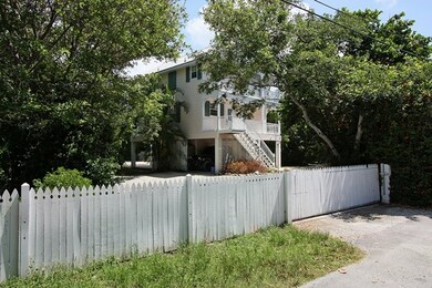 Front, fenced yard