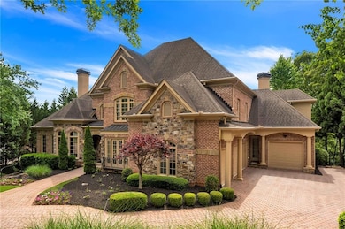 View of front of home featuring a garage
