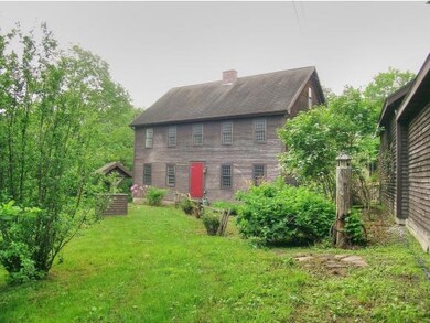 Set on wooded, private 5 acres