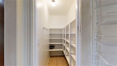 Good size walk in pantry across from the butler pantry