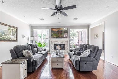 Light and bright Family room that overlooks the Backyard Oasis. Motorized blinds Taylored to the picture windows.