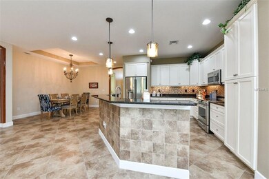 DINING ROOM OPEN TO KITCHEN AND GREAT ROOM