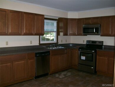 Kitchen with new vinyl floor, new appliances, new 