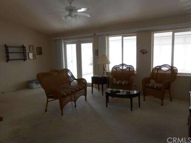 Ceiling fan in living room.