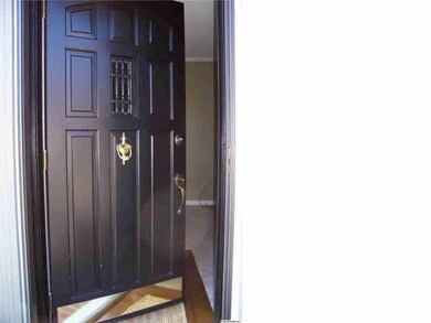 Beautiful front door welcomes visitors.
