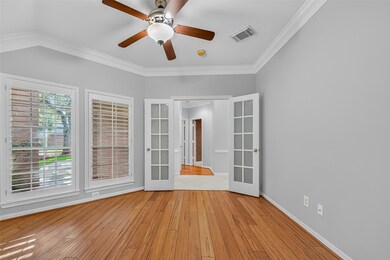 Another view of spacious study/flex room with wood