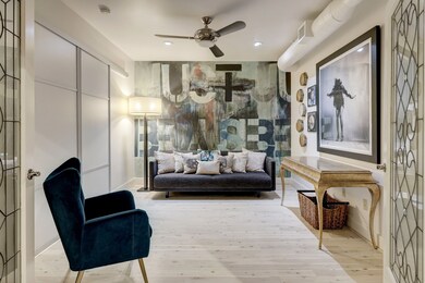 The first bedroom with artistic wallpaper.