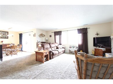 Living/dining area. Open and bright.