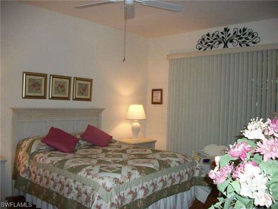 Master Bedroom with view of lanai and landscape ar