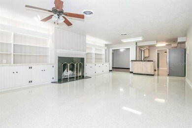 family room adjoins kitchen and breakfast room