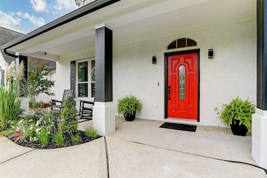 This stunning shot showcases the wonderful porch that captures the coastal breeze and provides ample space to accommodate large patio furniture with multiple seating arrangements.  The oversize columns help to provide perfect scale and proportion to the front elevation of this home.