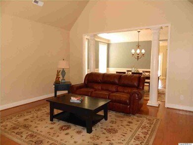 From the Foyer, looking into the spacious, vaulted Great Room into the Dining Room.