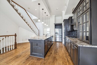 Another view of the kitchen looking towards the ha
