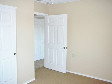 Guest bedroom has fresh paint/carpet