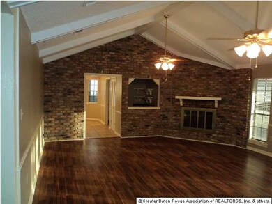 Living room with vaulted ceilings