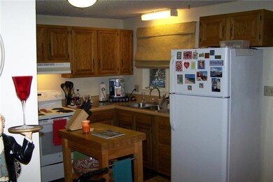 Galley kitchen... also an area for a...