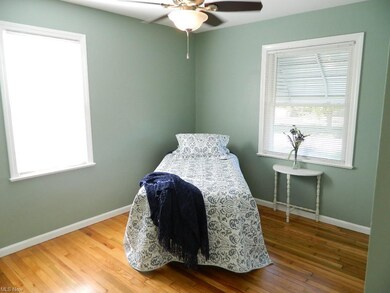 One of Two First Floor Bedrooms - Hardwood Floorin