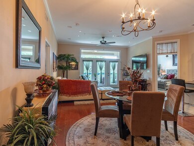 Wood floors throughout the living area, with high