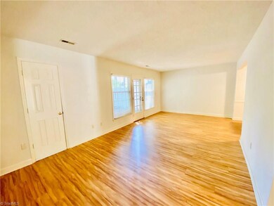Living Room w/access to patio and laundry room