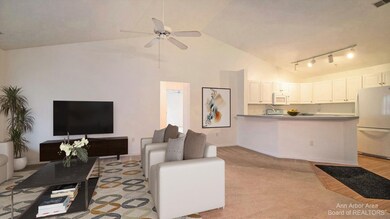 Virtually staged living and kitchen