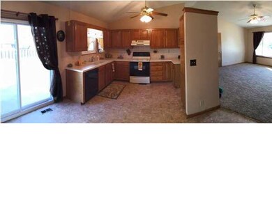 KITCHEN FEATURES PLENTY OF CABINETS & COUNTER SPAC