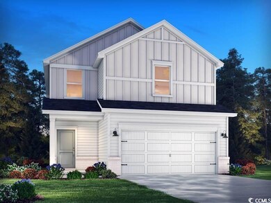 View of front of home featuring board and batten siding, driveway, and a front lawn