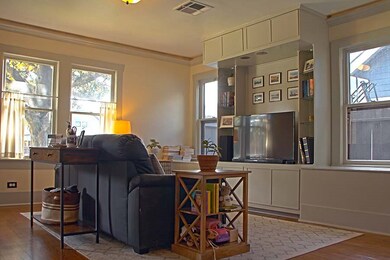 Formal Living at front of home with Built in, abun