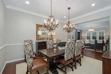 Large dining room with adjoining butler's pantry.