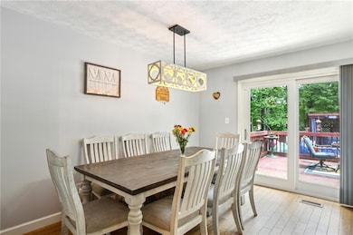 Dining Area Overlooking A Beautiful Outdoor Area