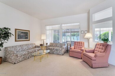 LIVING ROOM AS VIEWED FROM FRONT ENTRY FOYER.