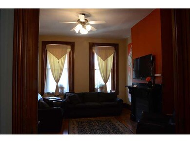 Living Room. High ceilings and tall windows.  Tons