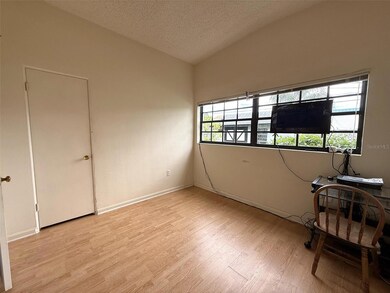 Living Room view into Dinette & Foyer Area