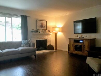 Living room has FIREPLACE.