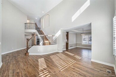 Living room looking to the stunning staircase
