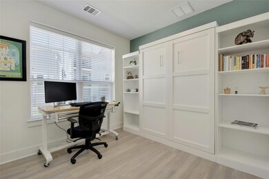 Office space featuring light wood finished floors