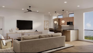 Living room with light wood finished floors, rece