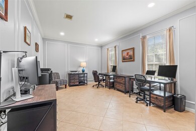The formal living room is just off the foyer and o