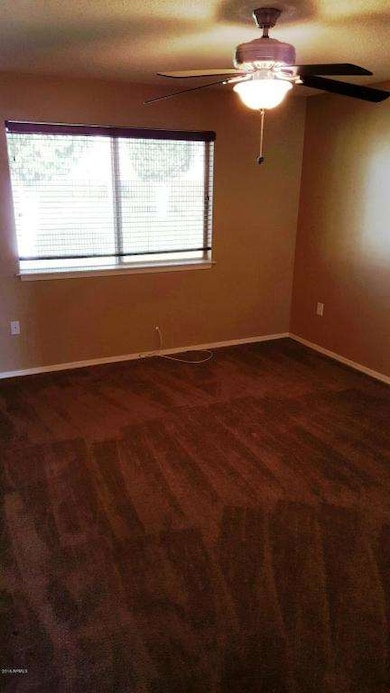 Master bedroom w/ceiling fan.