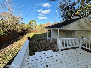 Deck featuring a fenced backyard