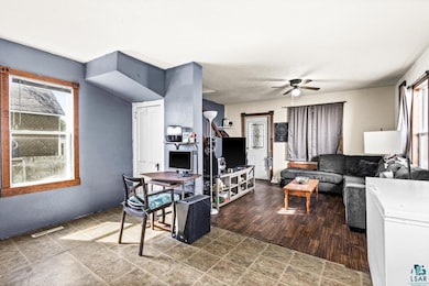 Living area with a ceiling fan