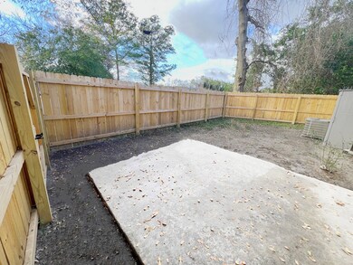 side yard with privacy fence