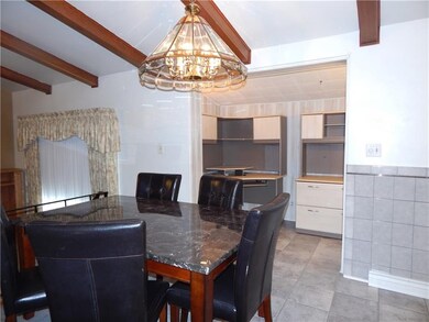 The ceramic tile flooring adds a nice touch to the