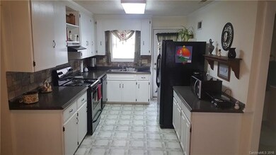 Open kitchen with side entrance