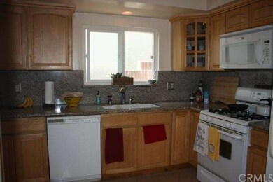 Granite kitchen counters highlight the kitchen.