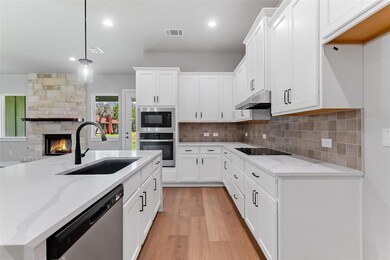 Kitchen with stainless steel appliances, under ca